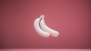 Two bananas upside down pink - down free wallpaper