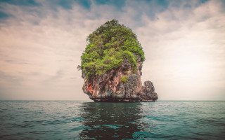 Small island ocean tree sky - liminal space free wallpaper