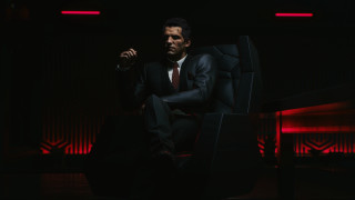 Man in suit sitting red - unreal engine 5 quality free wallpaper