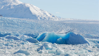 Large iceberg mountain person snow - a large iceberg free wallpaper
