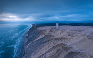 Lighthouse cliff ocean cloudy sky - white cloud above free wallpaper for desktop
