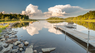 Lake dock bench cloudy sky - free ship wallpaper