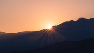Sunset mountains bird lens flare - over the mountain free wallpaper