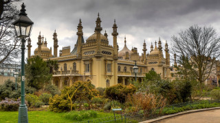 Large building windows clock tower - a light pole free wallpaper