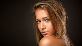 Woman longhair browndress portrait blackbackground - a brown dress free wallpaper