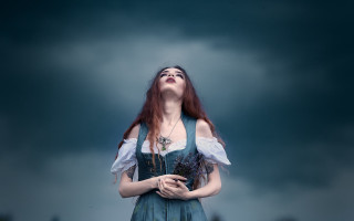 Woman blue dress cloudy sky 2 - under a cloudy sky free wallpaper