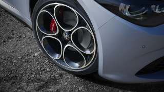 Car tire red brake rim - a close up of a car tire free wallpaper
