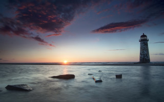 Lighthouse beach sunset rocks water - andrew geddes free wallpaper