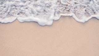 Sandy beach waves white surfboard - a sandy beach free wallpaper