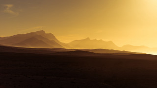 Mountain range yellow sky clouds - amir zand free wallpaper