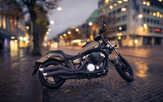 Motorcycle rainy night brick road - building free wallpaper