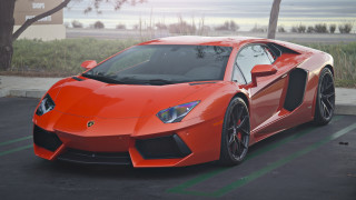 Red sports car parking lot 66 - vibrant color free wallpaper