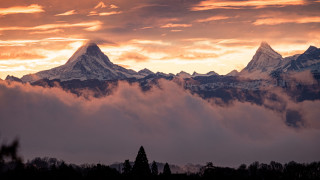 Mountain range clouds sunset cityscape 2 - a mountain range free wallpaper
