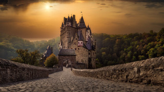 Castle stonewalkway sunset clouds gothic - a stone walkway free wallpaper