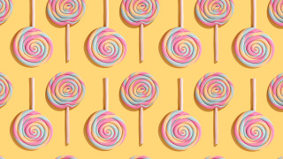 Lollipop pattern yellow pastel surreal - a spiral design free wallpaper