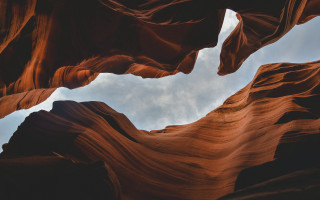 Rock formation sky clouds cave - a sky in the background free wallpaper