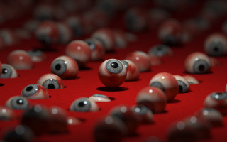 Red balls eyes blurry bokeh - a red surface free wallpaper
