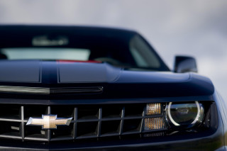 Black chevrolet camaro road cloudy - a cloudy sky in the background free wallpaper for desktop
