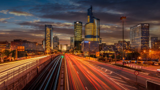 City skyline train crossing night - bernard meninsky free wallpaper