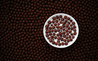 White bowl chocolate balls minimalism - a white bowl free wallpaper