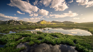 Lake mountains green plants clouds - free landscape wallpaper