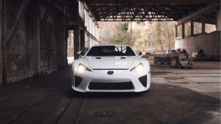 White sports car garage open - a garage free wallpaper