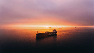 Cargo ship ocean sunset mountain - arie smit free wallpaper for desktop