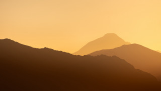 Mountain range bird sunset hazy - hazy free wallpaper