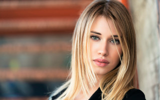 Blonde woman black shirt bookcase - long blonde hair free wallpaper