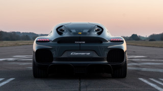 Black sports car parking lot 33 - back view free wallpaper