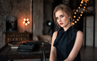 Woman typewriter city bokeh photorealistic - a woman sitting free wallpaper for desktop