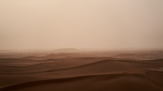 Desert sanddunes hills foggy sunset - a few sand free wallpaper