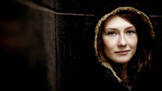 Woman hooded jacket serious expression - jacket free wallpaper