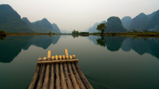 Bamboo raft lake mountains trees - free ship wallpaper
