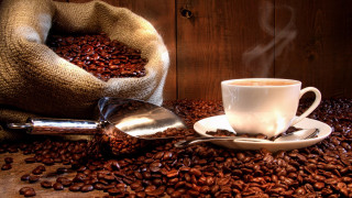 Coffee cup beans sack photorealistic - top of a pile free wallpaper