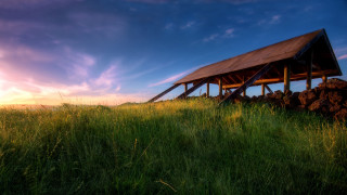 Wooden structure green field rocks 2 - a wooden structure free wallpaper