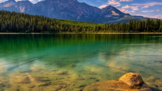 Mountain lake forest rocks sunset - clear water free wallpaper