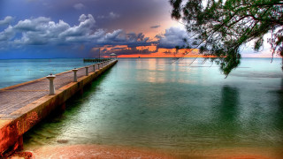 Long pier ocean cloudy sky - the ocean under a cloudy sky free wallpaper
