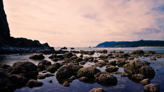 Rocky beach mountain water sky 2 - a rocky beach free wallpaper for desktop