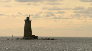 Lighthouse island ocean clouds sunset - a lighthouse free wallpaper