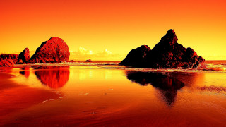 Red sunset rock formation beach - a rock formation free wallpaper