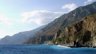 Mountain lake cliff clouds forest - a mountain side free wallpaper