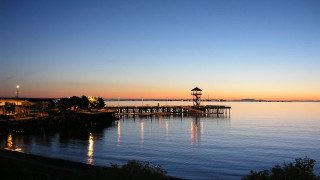 Pier light tower sunset lake - alan sutherland free wallpaper