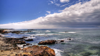 Rocky beach water cloudy sky 7 - free beach wallpaper