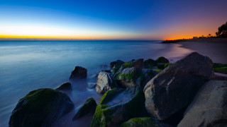 Sunset beach rocks water mountains 2 - rock and water free wallpaper for desktop