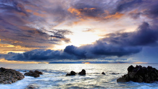 Sunset ocean cloud rocks boat - stormy weather free wallpaper