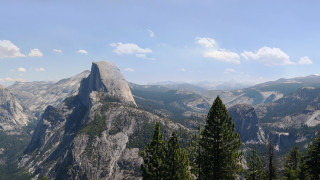 Mountain range forest clouds horizon - panoramic free wallpaper