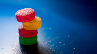 Gummy bears blue surface photorealism - gummy free wallpaper