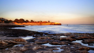 Beach rocky shore houses sunset - house free wallpaper