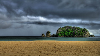 Bascove beach rock formation stormy - dark cloud free wallpaper